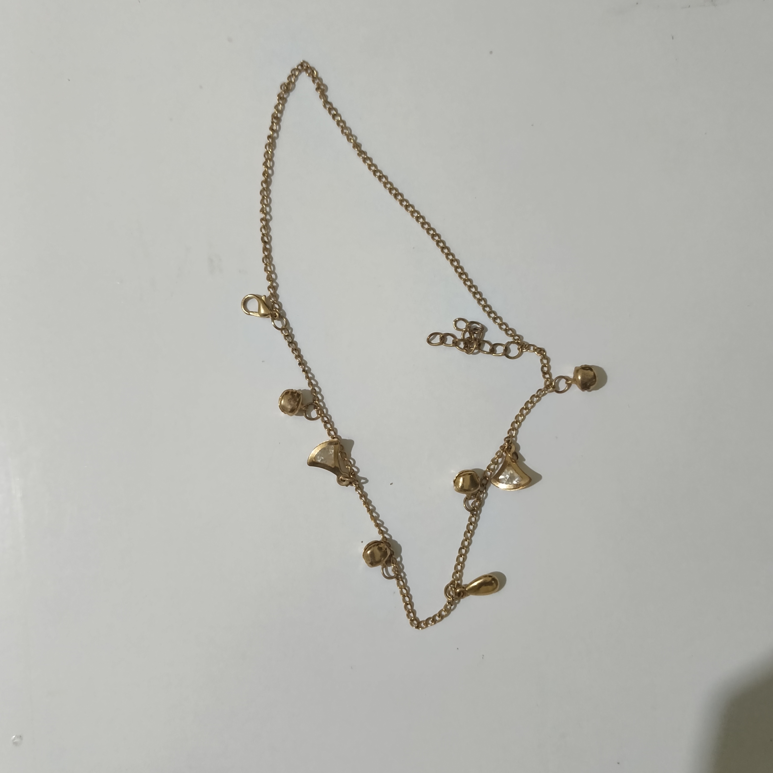 Gold Tone Charm Anklet with Bell and Fan Dangles